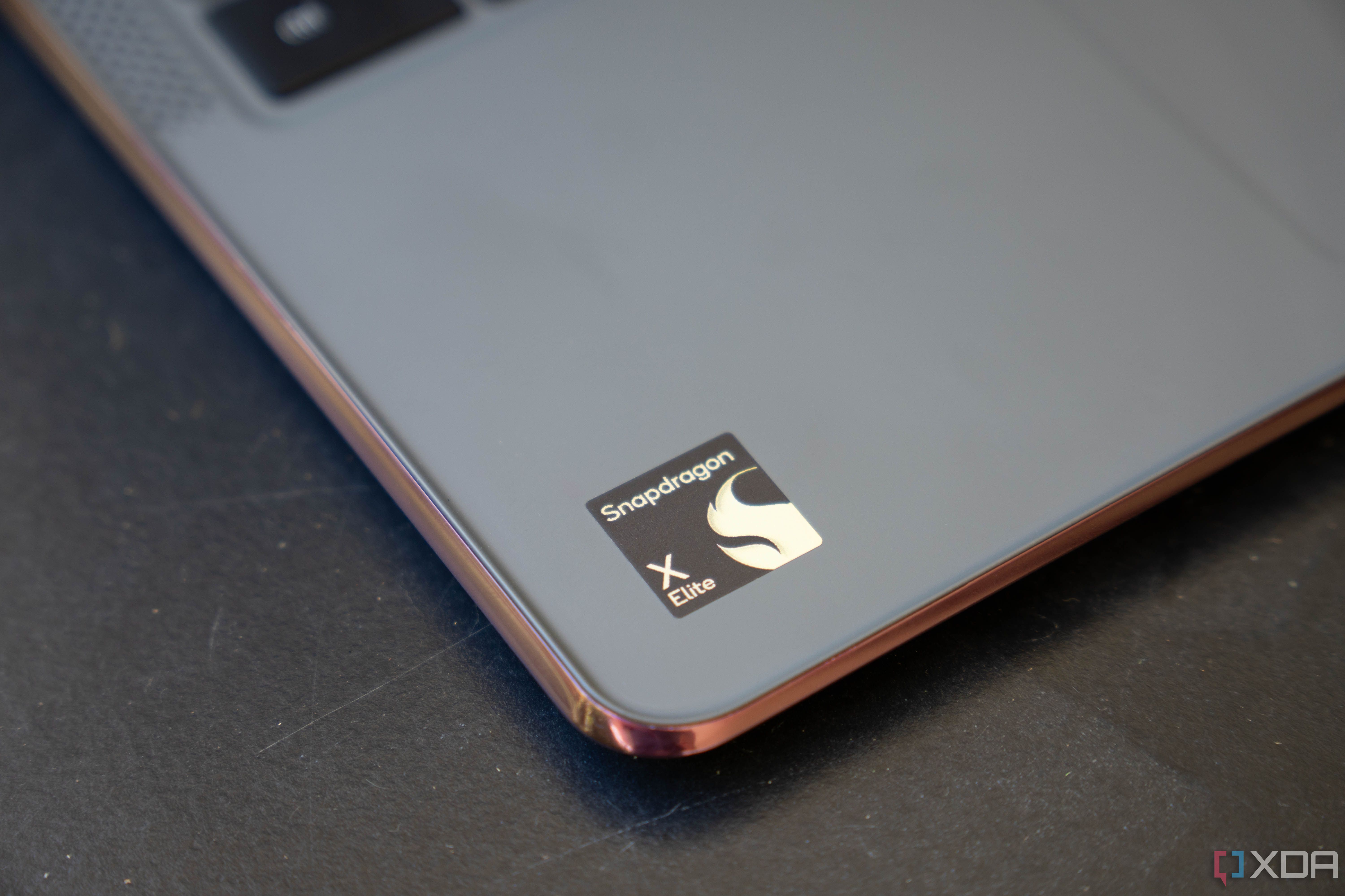 Snapdragon X Elite branding on the laptop's palm rest.